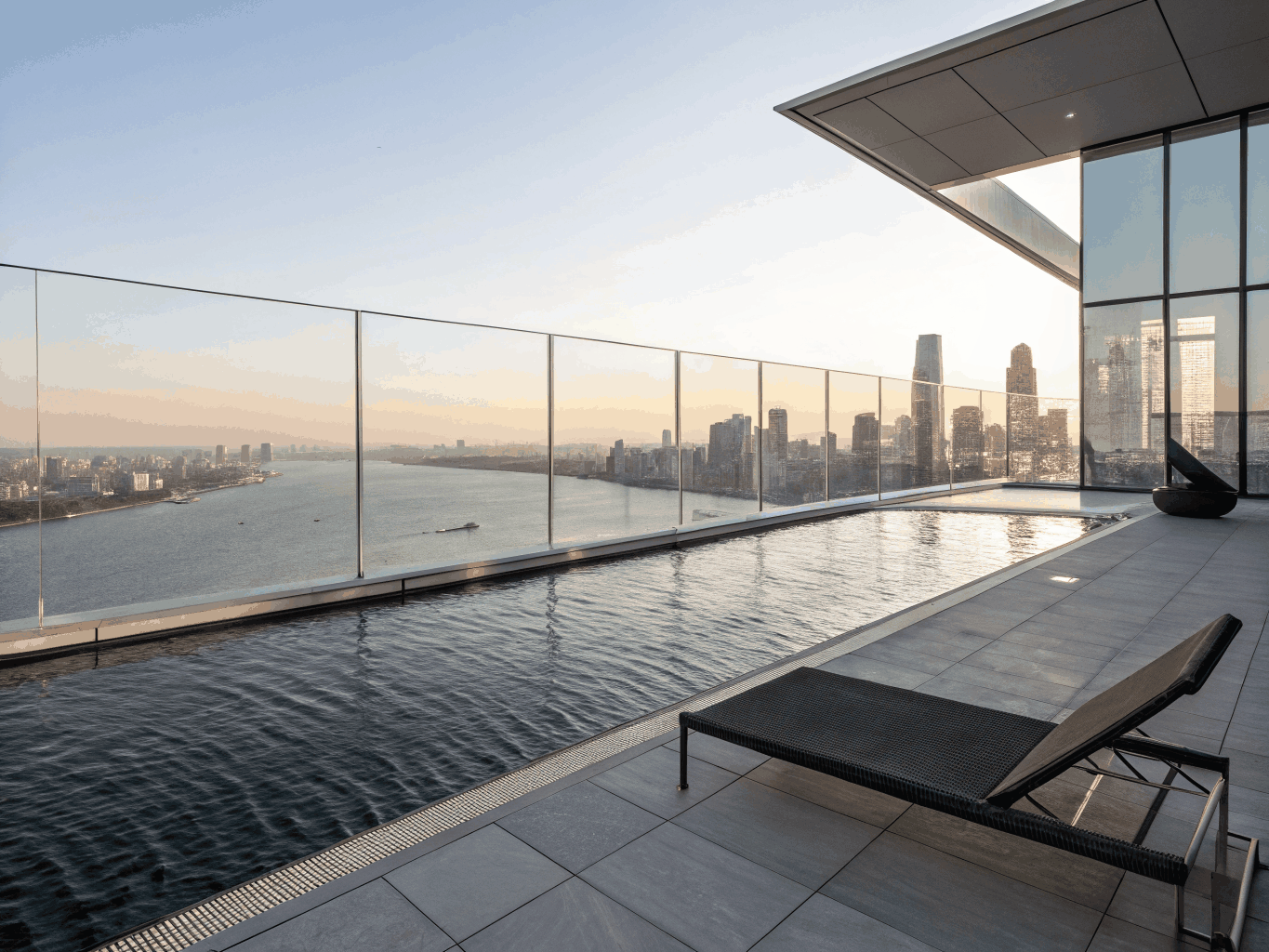 Resort-style outdoor infinity pool and private lounge terrace