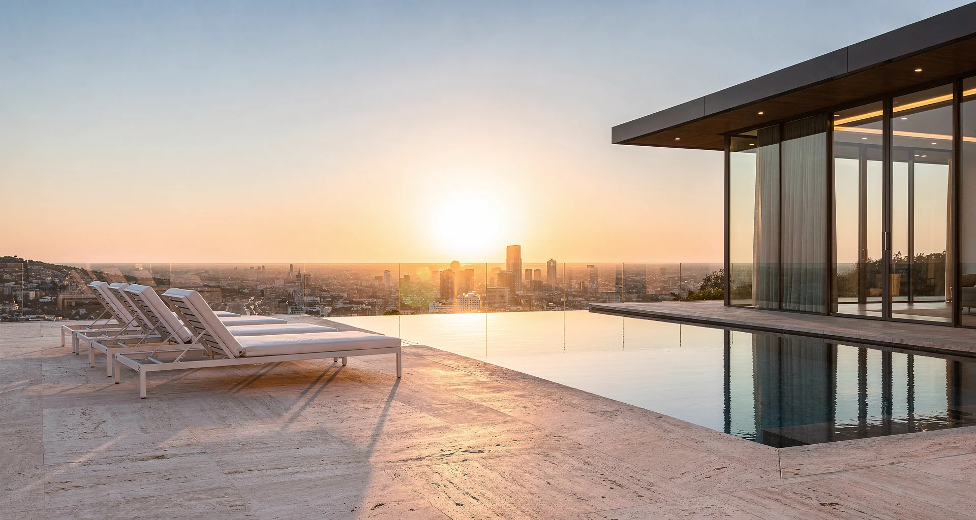 Luxury resort-style swimming pool and lounge deck